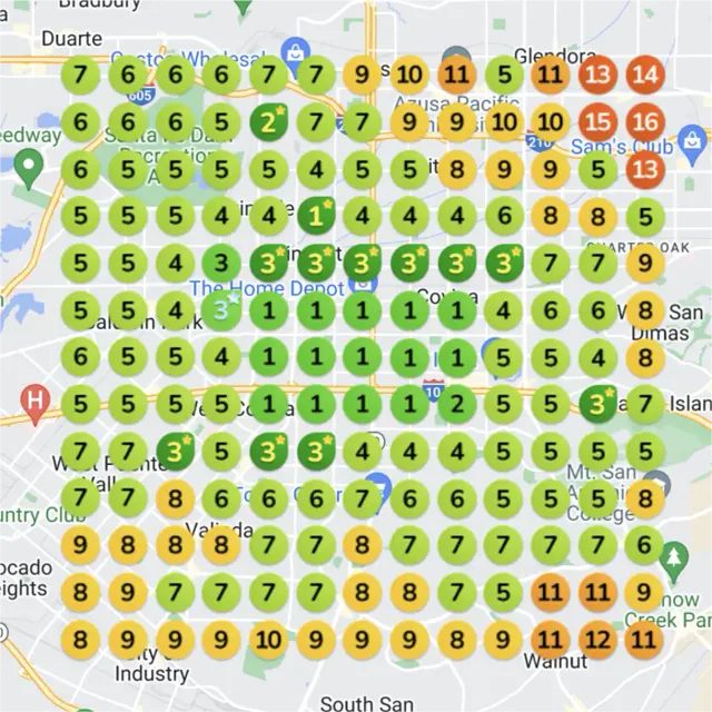 Ranking map for a spa, 4 months later: a grid of numbered dots over a town map, each showing where the business came up on Google Maps for "hot stone massage" from that spot